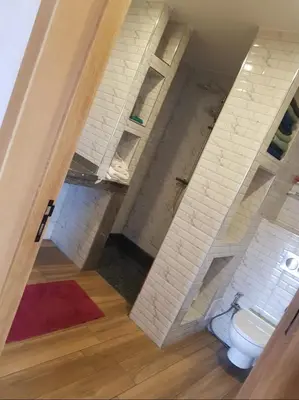 a bathroom with a toilet in a room at My HOME in Tinerhir