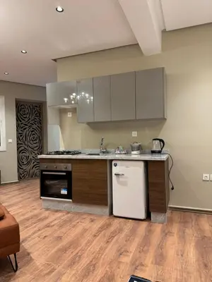 a kitchen with a sink and a counter top at Suite Bahiya 19 in Fès