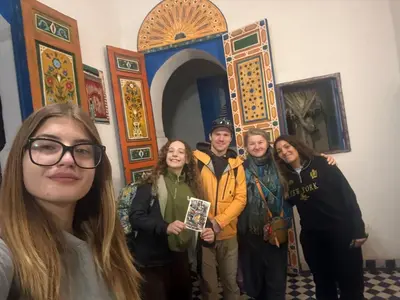 a group of people standing in a room at Dar Fez Arinas - Rooftop View - Central Fez in Fès