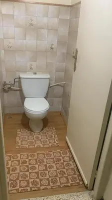 a bathroom with a white toilet in a room at Quartier labeta centre ville in Fès