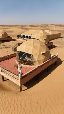 a boat in the middle of the desert at Sahara Dome Camp in Merzouga