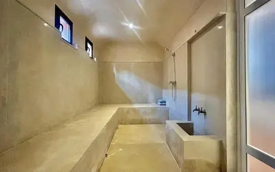a bathroom with a tub and a sink at Villa Sbaa Marrakech in Marrakech