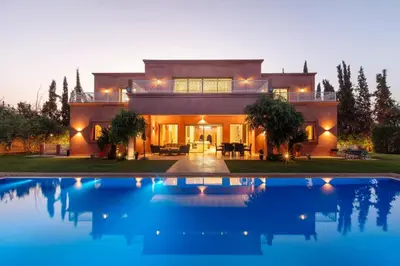 a house with a swimming pool in front of it at Villa Lamaan - Domaine prive piscine et hammam in Douar bel Rhanodour