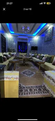 a living room with a couch and a table at Soulta villa in Marrakech
