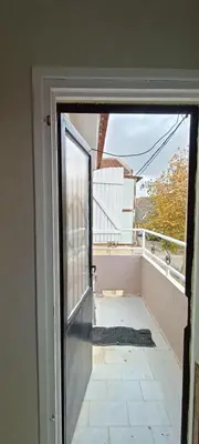 an open door to a balcony with a view at Quartier habri imouzzer kandar in Imouzzer Kandar