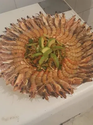 a close up of a bunch of carrots on a table at Hotel OUM EL FADL in Fkih Ben Salah