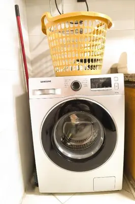 a washing machine with a basket on top of it at Darkoum, your apartment in fes city in Fès