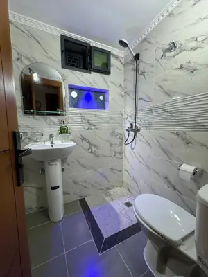 a bathroom with a sink and a toilet at Paradise luxe in Fès