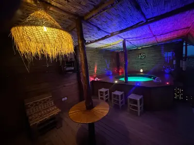an overhead view of a bar in a room at Paradise luxe in Fès