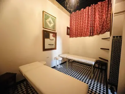 a hospital room with a bed and a window at Riad Dar Tahri & SPA in Fès