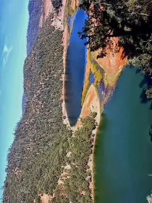 an aerial view of a mountain next to a body of water at Appartement Cosy avec piscine à Khenifra in Khenifra