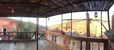 a balcony with a view of a mountain view at Ounilla valley in Tizgui nʼBarda