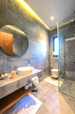 a bathroom with a sink and a shower at Villa Safira, Haut-Standing avec piscine & Hammam in Marrakech