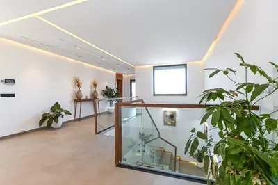 a room with plants and a glass case at Villa Safira, Haut-Standing avec piscine & Hammam in Marrakech