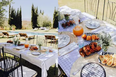 a table with food and orange juice on it at Villa A Atlas Retreat Luxury B and B Beni Mellal in Beni Mellal