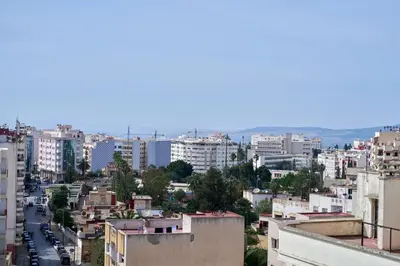 a cityscape of a city with buildings at Hotel Bab Mansour in Meknès