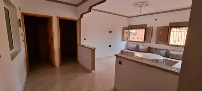 a kitchen with a counter top in a room at Appartement neuf centre ville de Tinghir in Tinerhir