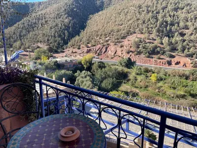 a balcony with a view of a mountain at Kasbah Tifirte Grand Vallet in Ourika