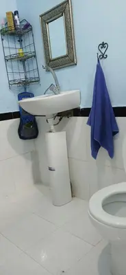 a bathroom with a sink and a toilet at Moha House in Merzouga