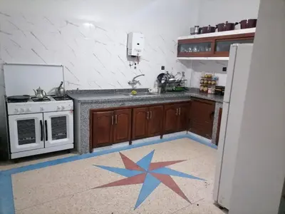 a kitchen with a star painted on the floor at Big flat in ouarzazate city, Morocco in Ouarzazate