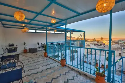 a large balcony with a view of the water at Dar Fes Flower in Fès