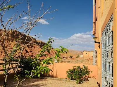 a view from the side of a building in the desert at Kasbah Alami in Kalaat MGouna