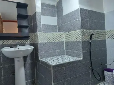 a bathroom with a shower and a sink at Riad Amira Fes in Fès
