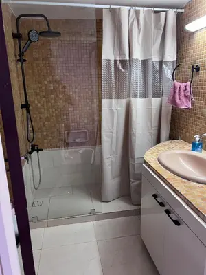 a bathroom with a shower and a sink at Escapade à Fes in Fès