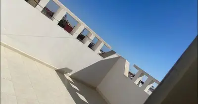 a group of stairs in a building at Casa de playa in Oulad Akkou