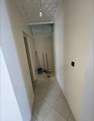 a hallway with a room with two baseball bats at Casa de playa in Oulad Akkou