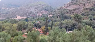 a village in the middle of a mountain at siti fadma ourika Marrakech in Aghbalou