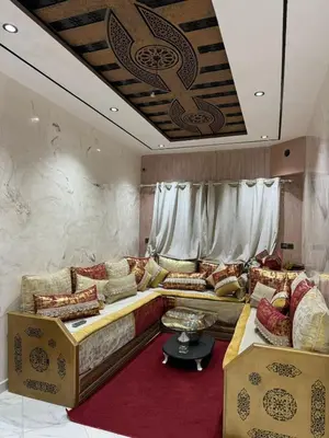 a living room with couches and a ceiling with an anchor on it at house Perfect well equipped in Midelt