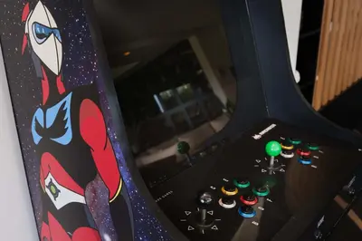 a video game controller with a picture of a cat on it at Villa Shelter in El Bougaria