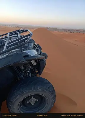 a wheel of a truck in the desert at Merzouga morocco in Tisserdmine