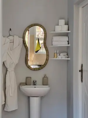 a bathroom with a mirror and a sink at Ourika Valley Haven - Breathe, Relax, Unwind in Ourika