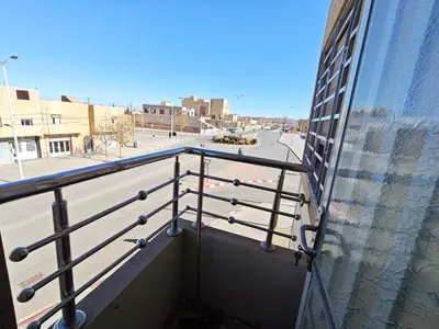 a balcony with a view of a city street at Dar Ines in Midelt
