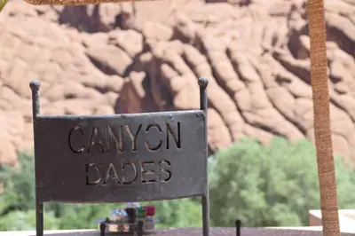 a sign that reads canyon jades in front of a mountain at Riad Dades Canyon in Akedim Msemrir