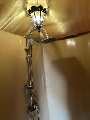 a light on the ceiling of a bathroom at Finest Luxury Camp in Merzouga