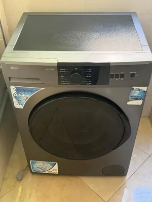 a computer monitor sitting on top of a television at Apartment, well equipped in Fès