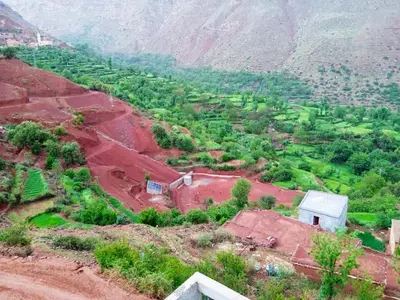 an aerial view of a village on a mountain at Refuge Comfort and Rustic Charm in Anammer