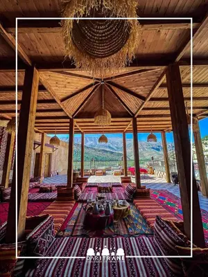 a large room with a view of a mountain at Ecolodge Dar itran in Azilal