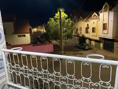 a view from a balcony at night at شقة للكراء اليومي in Azrou