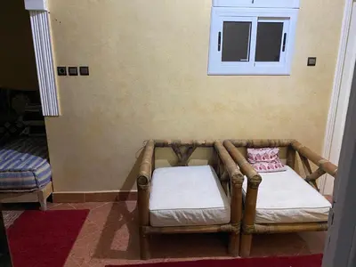 a small room with a couch and a window at شقة للكراء اليومي in Azrou