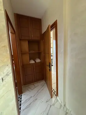 an empty room with a door and a room with a room at Oasis deluxe in Fès