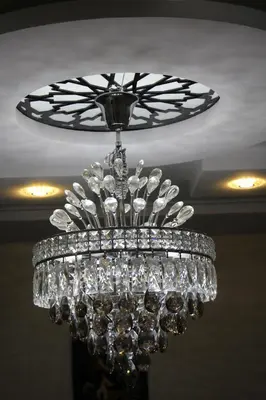 a chandelier hanging from a ceiling at appartement amira ifrane in Ifrane