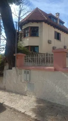 a house with a fence in front of it at Dolce Vita Nid Douillet alias Havre de Paix O Coeur d Ifrane in Ifrane