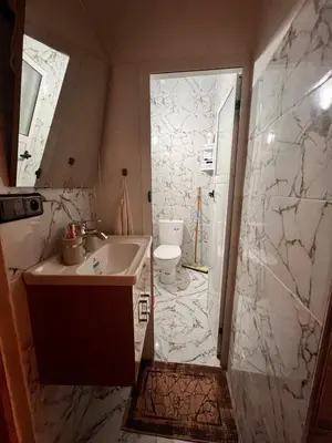 a bathroom with a sink and a toilet at Dar Igri in Ourika