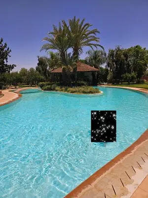 a pool with a picture of stars in the water at Maria in Najem