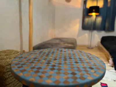a blue and orange table in a living room at Pikala Home in Ourika