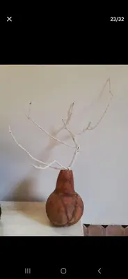 a vase sitting on top of a table at Appartement privé Medina in Fès